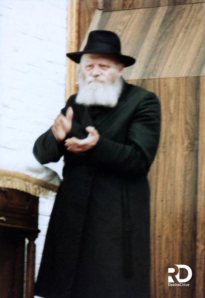 Encouraging the singing at Simchas Beis Hashoeivah